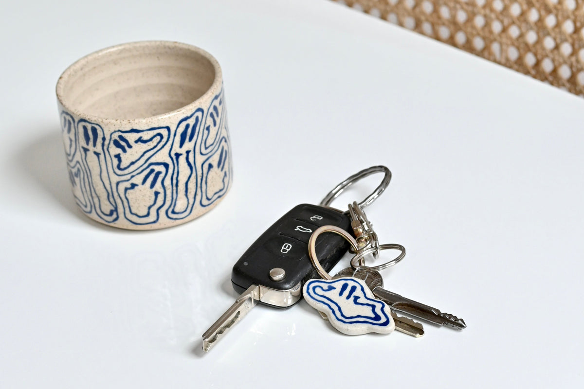 blue smiley key chain
