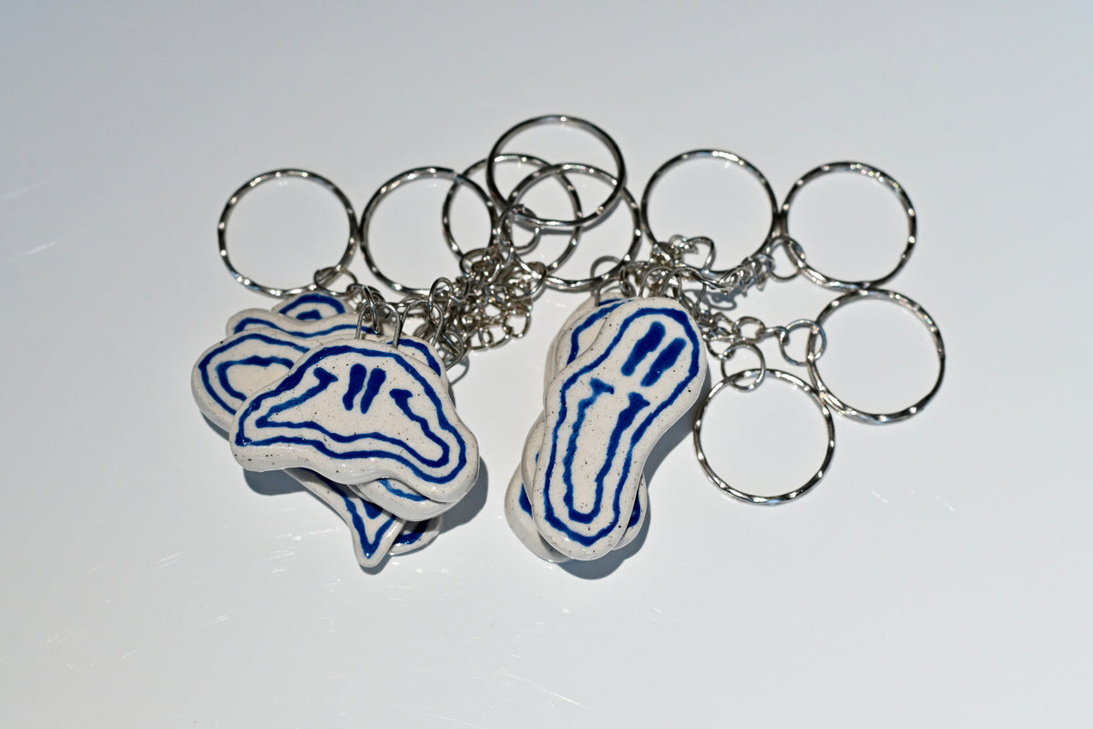 blue smiley key chain