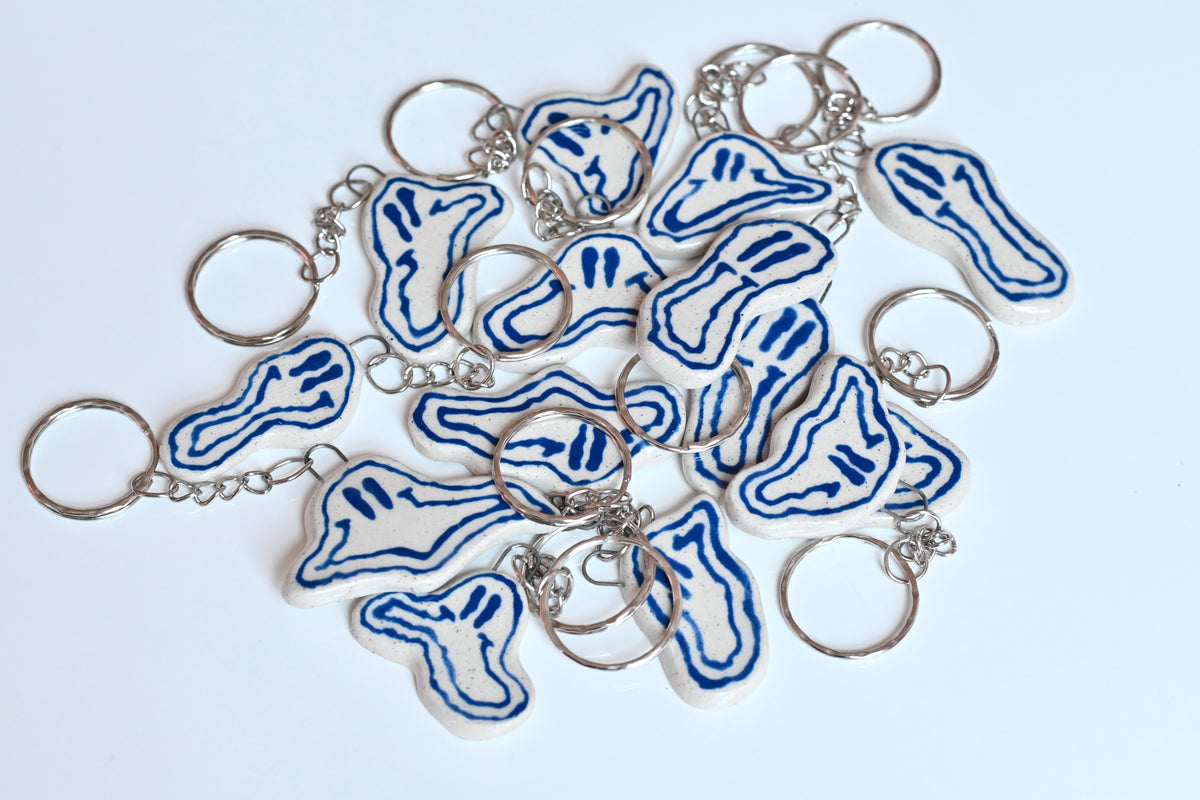 blue smiley key chain